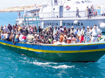 Caos immigrazione, guerra per procura? 